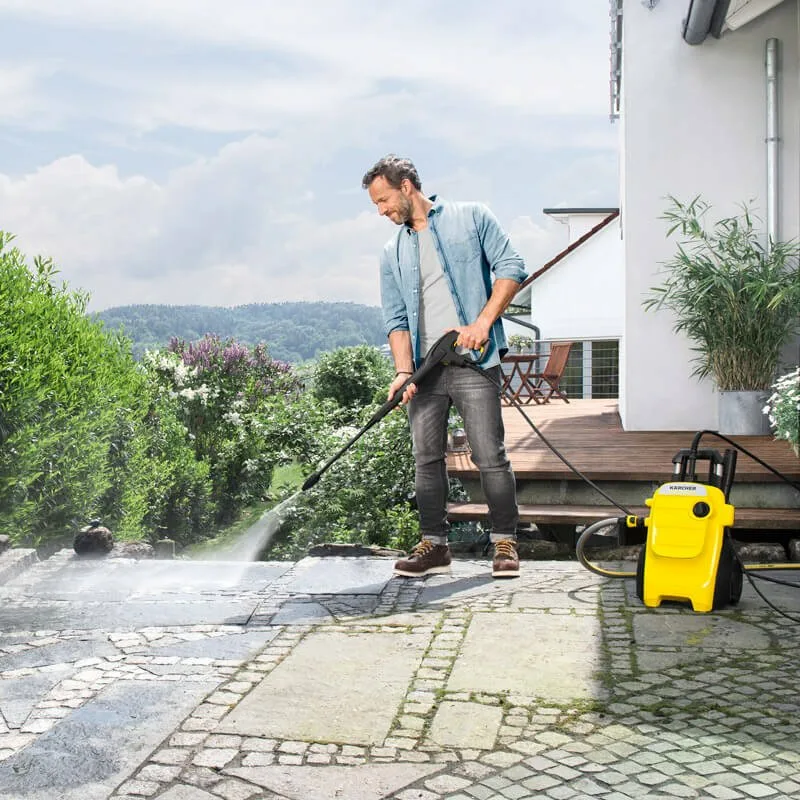 Professional cleaning the exterior of a residential property with a pressure washer in Pennsauken, NJ